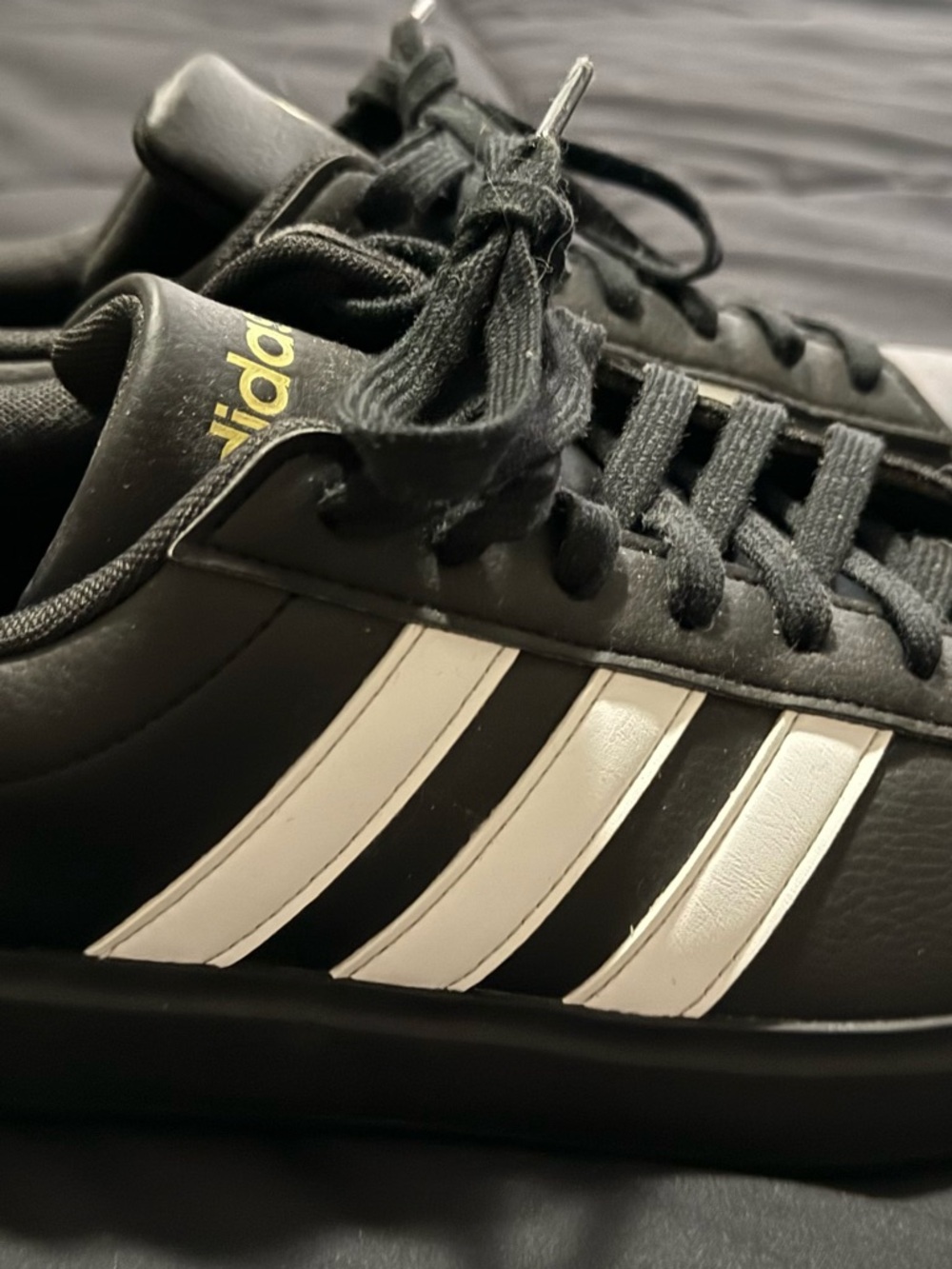 Adidas Women’s Black Sneakers with White Stripes size 9.5
